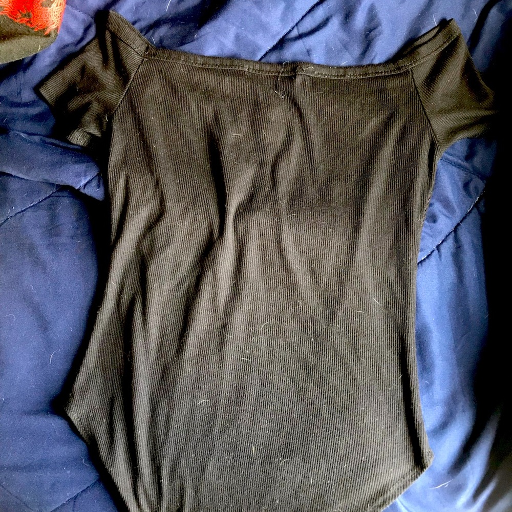 Shirt with clip in the bottom. Buttons up top